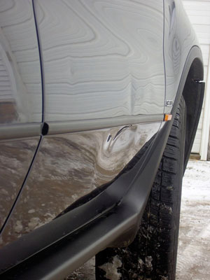 BMW X5 big door dent needing repair