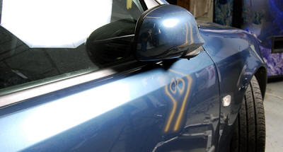 Plymouth, MN dent repair on body line of door