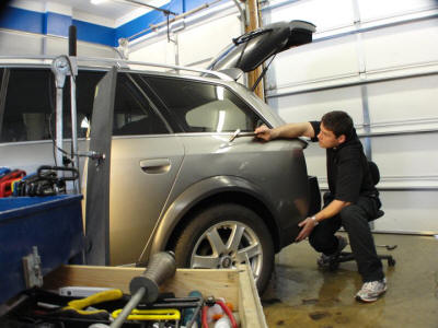 repairing audi wagon deer dent at Dent Werks PDR in Delano, Minnesota