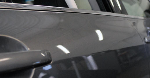 Body line dent repair using PDR at Dent Werks PDR in Plymouth, MN